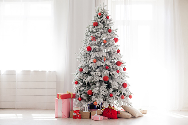 white-christmas-tree-with-gifts-underneath